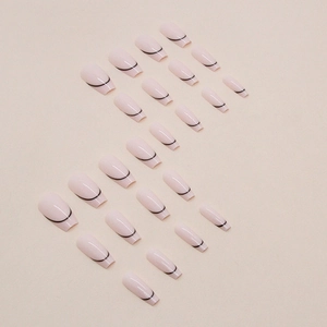 Minimalist French press-on nails with black curved lines on a nude pink base