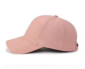 Side view of pink baseball cap with premium twill texture and adjustable strap