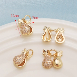 14K gold plated pineapple charm pendant with sparkling cubic zirconia inlay 13x7mm