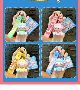 Collage de quatre porte-clés chat floqués avec sangles Little Monster.