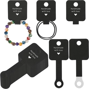 Set of black folding jewelry display cards for bracelets featuring Handmade with love text