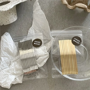 Minimalist gold and silver alloy hair clip set featuring 10 pieces for styling and makeup