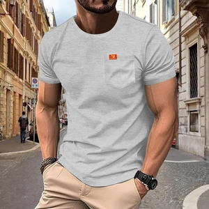 Men's casual grey short sleeve T-shirt with chest pocket in a street style outdoor view