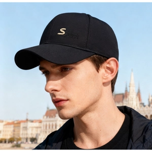 Close-up of black men's baseball cap featuring premium gold 'S Sports' embroidery