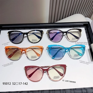 Close-up of cat-eye photochromic glasses in five colors with model 95012 on white tray