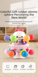 Macro view of macaron-colored silicone teething ball with suction cup base for baby teething