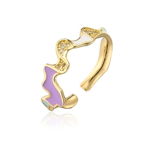 Detail of 18K gold-plated wavy ring featuring colorful enamel and micro-set cubic zirconia