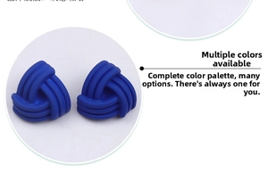 Close-up of matte blue triangular knot stud earrings with geometric resin design