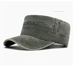 Detail of military green flat top cap featuring vintage washed cotton and side metal eyelets