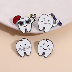 Set of four cute cartoon tooth enamel pins featuring sunglasses, braces, and toothbrush