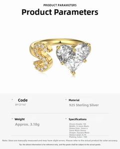 Detail of S925 sterling silver ring with 18K gold plating and heart zircon setting