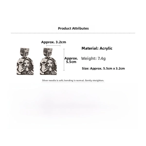 Detail view of abstract acrylic face earrings with size dimensions 5.5cm by 3.2cm