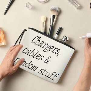 White canvas organizer pouch with 'Chargers, cables & random stuff' text and zipper