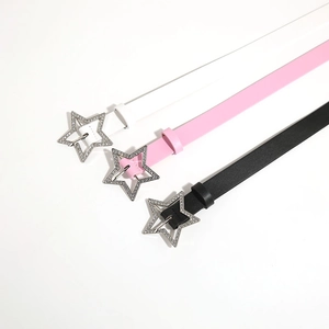 Y2K style pink, white, and black skinny leather belts with rhinestone star buckles