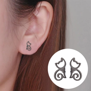Retro minimalist hollow cat stud earrings in black stainless steel for women