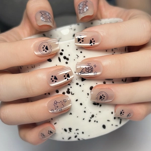 Champagne cat eye press-on nails with cute hand-painted bear and flower patterns