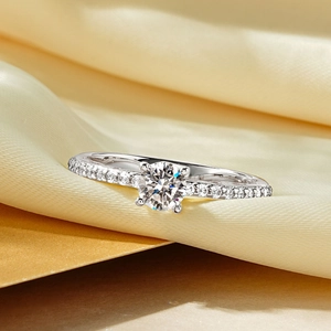 Elegant 14k gold plated moissanite ring with round center stone and pave accents