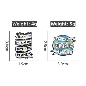 Detail view of feminist enamel pins with text showing dimensions and weight specifications
