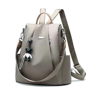 Classic grey waterproof Oxford cloth women backpack with a cute bear pendant accessory