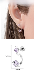 Detail of C-shaped earring with lilac star zircon and polished silver metal finish
