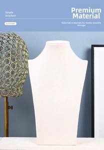 Close-up of beige velvet necklace display stand with portrait neck design for jewelry