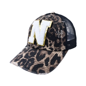 Detail of leopard print trucker hat with N patch, distressed brim and breathable mesh