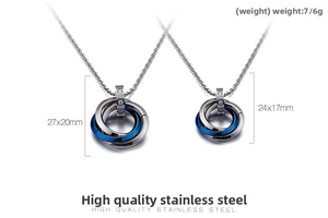Detail view of interlocking three-ring stainless steel pendants with crystal accents