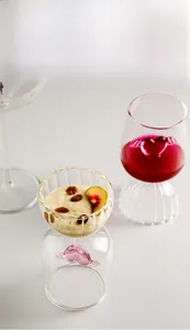 Creative glass goblet featuring pink 3D heart and wings detail used for desserts and wine