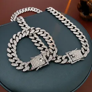 Iced out silver cuban chain necklace and bracelet set with sparkling rhinestones