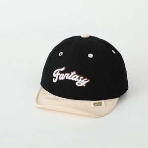 Close-up of Fantasy 3D embroidery and side label on a two-tone cotton kids baseball cap