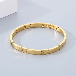 Close-up of gold-plated tungsten steel bracelet with brushed and polished surface