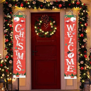 Red Christmas door banners with Santa and Snowman hanging on a festive porch