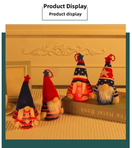 Set of four light-up Independence Day gnomes with American flag patterns and knit texture