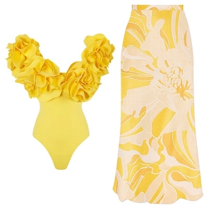 Two-piece yellow bodysuit set with 3D floral accents and high-waist floral print skirt