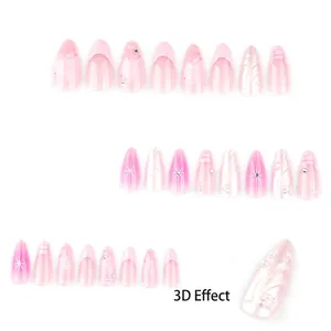 3D French water ripple press-on nails in pink gradient with pearls and rhinestones