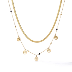 Double-layered gold tree of life necklace featuring a sleek snake chain and beaded feather pendant