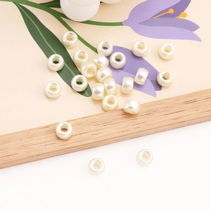 Cremeweiße runde ABS-Perlen mit Mittelloch für DIY-Schmuck und Perlenketten