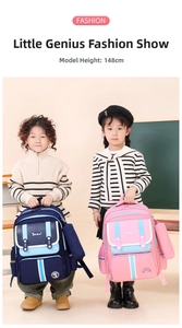 Navy and pink ergonomic school bags shown with matching small pouches in classroom