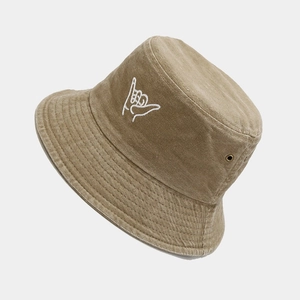Khaki cotton bucket hat with white finger embroidery shown from a 45-degree side angle