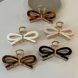 Lot de pinces à cheveux nśud minimalistes en acétate et métal aux motifs d'écaille
