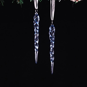 Detailed view of blue transparent spiral icicle ornaments with white hanging ribbons