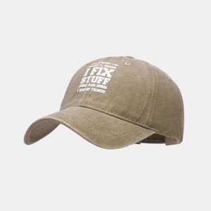 Detailed view of washed cotton fabric and printed slogan on this vintage baseball cap