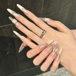 Pink glitter handmade press-on nails with 3D white floral patterns and pearls