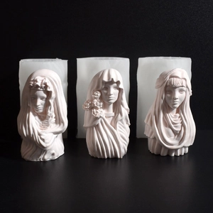 Détail macro du moule en silicone de déesse 3D et bougie avec textures faciales fines