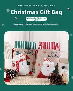 Close-up of Santa Claus and Snowman burlap drawstring bags for Christmas gifts