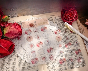 Macro detail of rose-themed 3D resin embossed stickers with vintage floral and fox motifs