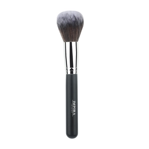Close-up of soft fluffy makeup brush with silver ferrule and black handle by Impora London