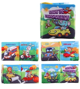 Detailed view of transport-themed soft cloth book showing ambulance and bicycle pages
