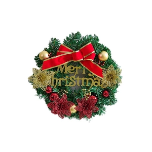 Christmas wreath with green pine needles, red bow, gold flowers and Merry Christmas sign
