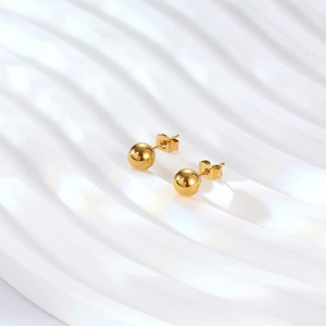 Minimalist golden titanium steel ball earrings with polished mirror finish for unisex